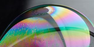 A close up of the surface of a soap bubble
